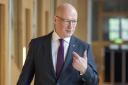 John Swinney is pledging the Scottish Government will be ‘relentlessly focused’ on the ‘people’s priorities’ (Jane Barlow/PA)