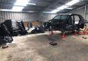 IN PHOTOS: Chop shop with stolen cars and bikes uncovered in south Essex