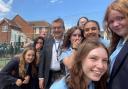 Family - Andrew Cooper, CEO, with pupils from Westcliff High School for Girls