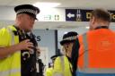 Deployed - Police officers speaking to Southend Airport staff