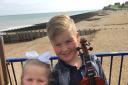 Indigo and Zack Johnson learn violin with East Sussex Music Service's lessons