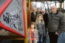 Angry – nieces of Jason Adams, Amber Clark, six, and Imogen Crumpton, ten, with Tony Doveaston, park ranger, James Herbert, horticultural officer and councillors Peter Burch and Norman Smith at the playground