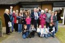 All done – councillor Frank Tomlin, the Rev Diane Ricketts, volunteers and children outside refurbished hall