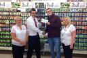 (l-r) Doreen Preston (assistant manager), James Biffen (store manager), Jez Bryan and Wendy Moseley (department manager)