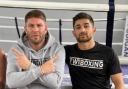 Determined - Shoebury based boxer Hamzah Butt (right), with trainer Billy Whitrod, will make his professional debut next month