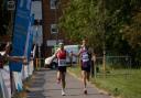 Winners - Shane Boxall (left) and David Smale run down the home straight of the Southend Half