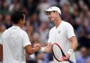 Memorable moment - Ryan Peniston (left) faced Sir Andy Murray at Wimbledon