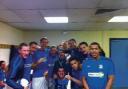 Southend United's players with Timmy Mallet in the dressing room