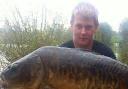 Great catch  – James Saunders and his 26lb mirror