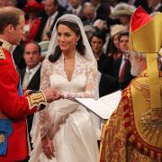 A decade on - Prince William and Kate Middleton exchange rings in front of the Archbishop of Canterbury at Westminster Abbey