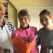 Winners - David Barnes (left) and Jo Redding (right) receive their prizes from Diana Sorrell after impressing on court at Southend Lawn