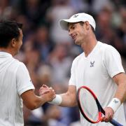 Memorable moment - Ryan Peniston (left) faced Sir Andy Murray at Wimbledon