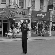 Directing traffic - a Southend warden confidently does his job in the High Street. Traffic wardens had been taught to direct traffic in the town since 1965.