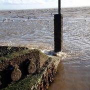 Figures - a sewage drain in Southend