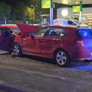 Scene - a red BMW and a red Volkswagen were involved in the crash