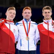 Max Whitlock on the podium again for the parallel bars along with Nile Wilson and Daniel Purvis