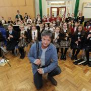 Musical maestro Piers Adams, with pupils from West Leigh and Bournes Green Junior Schools