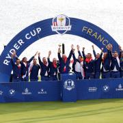 Triumphant - Team Europe celebrate after clinching the Ryder Cup at Le Golf National