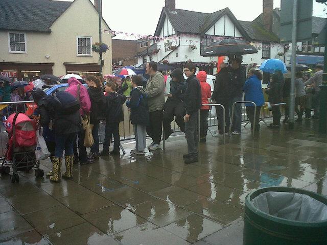 Crowds with brollies and waterproofs begin to line the route at 9am ahead of the Olympic Torch coming to the town at 10.20am. 