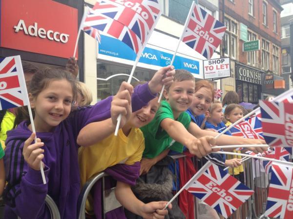 Excited children in Southend High Street wait for the arrival of the Olympic torch