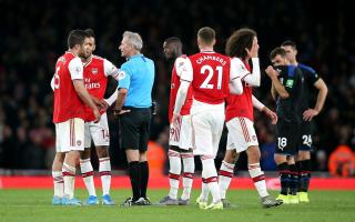 Referee Martin Atkinson gives the VAR decision of No Goal overturning the second goal by Arsenal's Sokratis Papastathopoulos during the Premier League match at the Emirates Stadium, London. PA Photo. Picture date: Sunday October 27, 2019. See PA