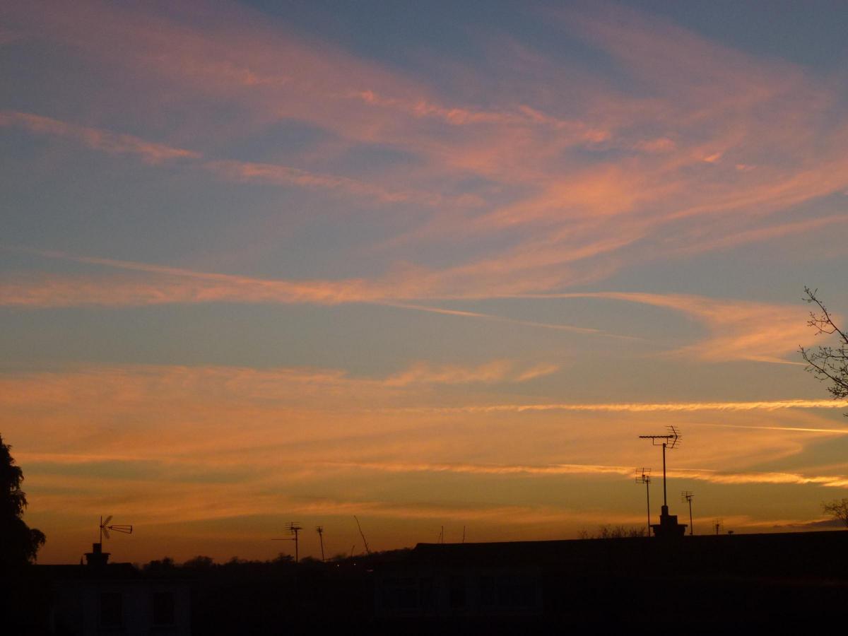 February 2015 After a beautiful spring day today,
 I took this picture over the roof-tops of Rochford. (Tuesday 17th Feb 2015)

Val Ewers.

