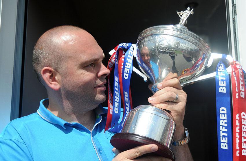 World Snooker champion Stuart Bingham at home with his trophy