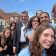 Family - Andrew Cooper, CEO, with pupils from Westcliff High School for Girls