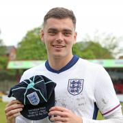 Proud - Southend United defender Ollie Kensdale with his international cap