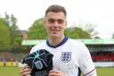Proud - Southend United defender Ollie Kensdale with his international cap