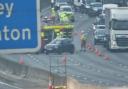 Traffic queueing as emergency services on scene of M25 crash in Essex