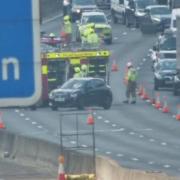 Traffic queueing as emergency services on scene of M25 crash in Essex
