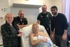 Hannah and Joel Rowlinson with baby Viola and the paramedics who helped
