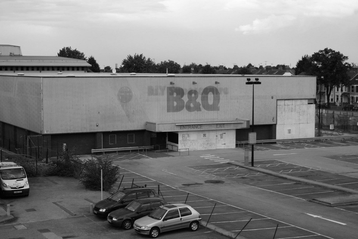 Gone - B&Q is pictured boarded up soon after closing its doors to customers