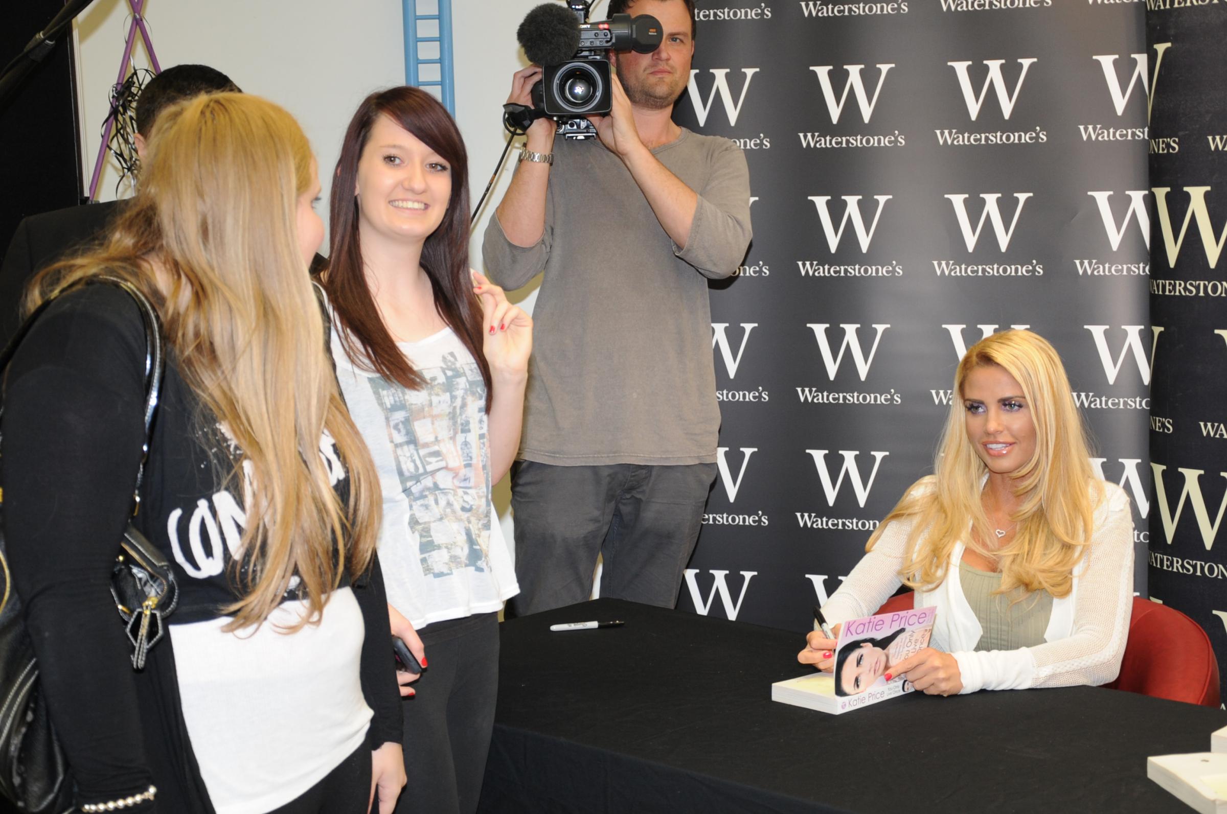 Signing her book - model Katie Price was greeted by thousands of fans at the Waterstones store in the Eastgate Shopping Centre