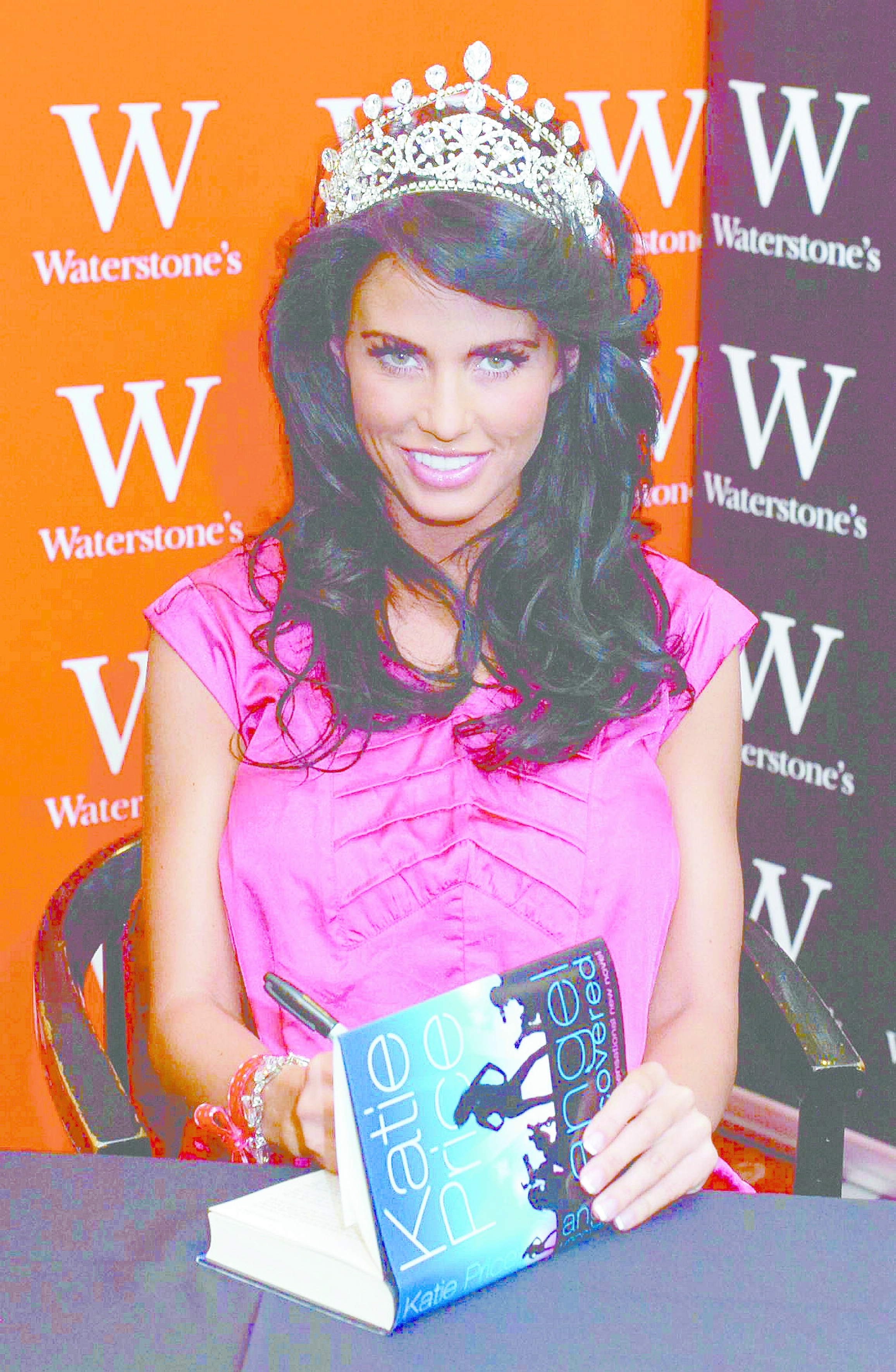 Dressed for the occasion - Katie Price wore a tiara as she signed copies of her book at the Southend High Street Waterstones in July 2008