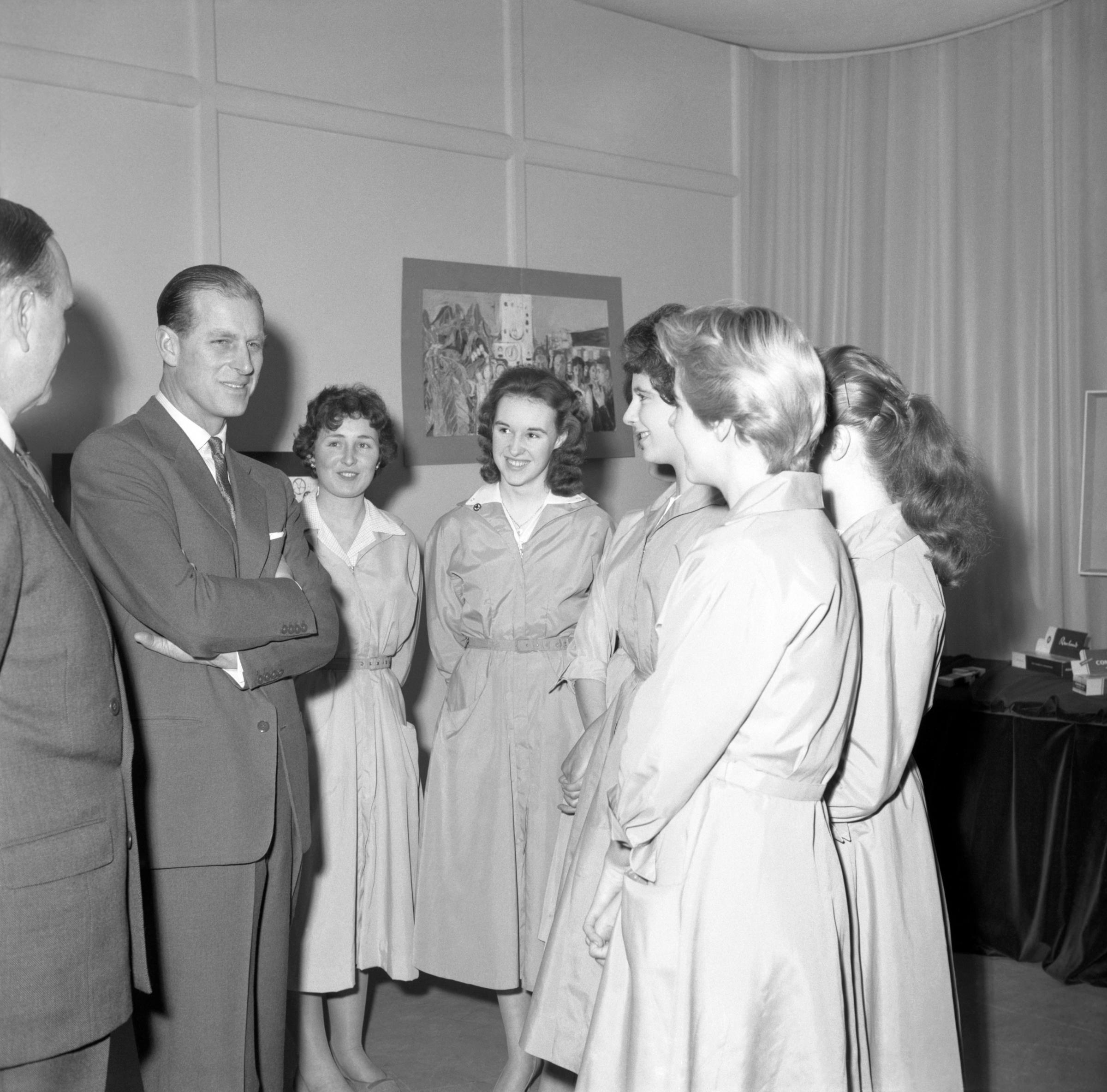 Duke of Edinburgh - Prince Philip chats to some of the girls who worked at the Carreras Tobacco Factory in Basildon during his visit to the premises in March 1960