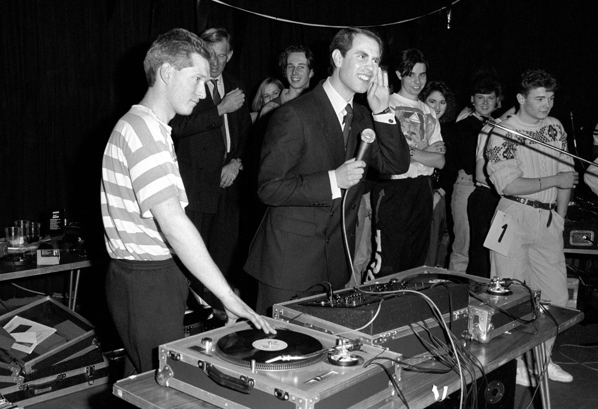 Pump the volume - Prince Edward takes over from DJ Andi Bird (left) at a 24 hour sponsored disco dance in 1989