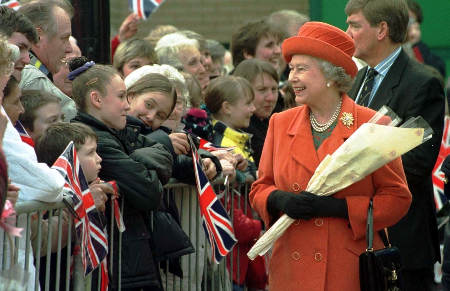 Meeting members of the community - the Queen walks in St Martins Square as part of her visit to Essex in March 1999