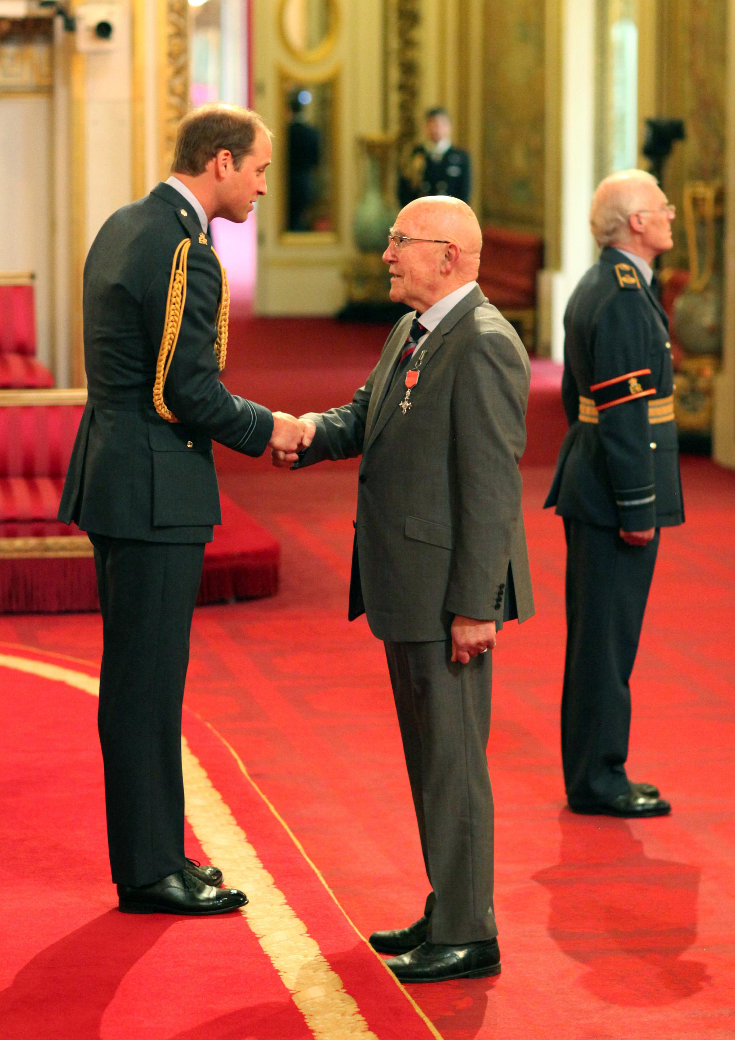 Memorable moment - Geoffrey Williams, from Basildon, is made an MBE by Prince William during a ceremony at Buckingham Palace in March 2014