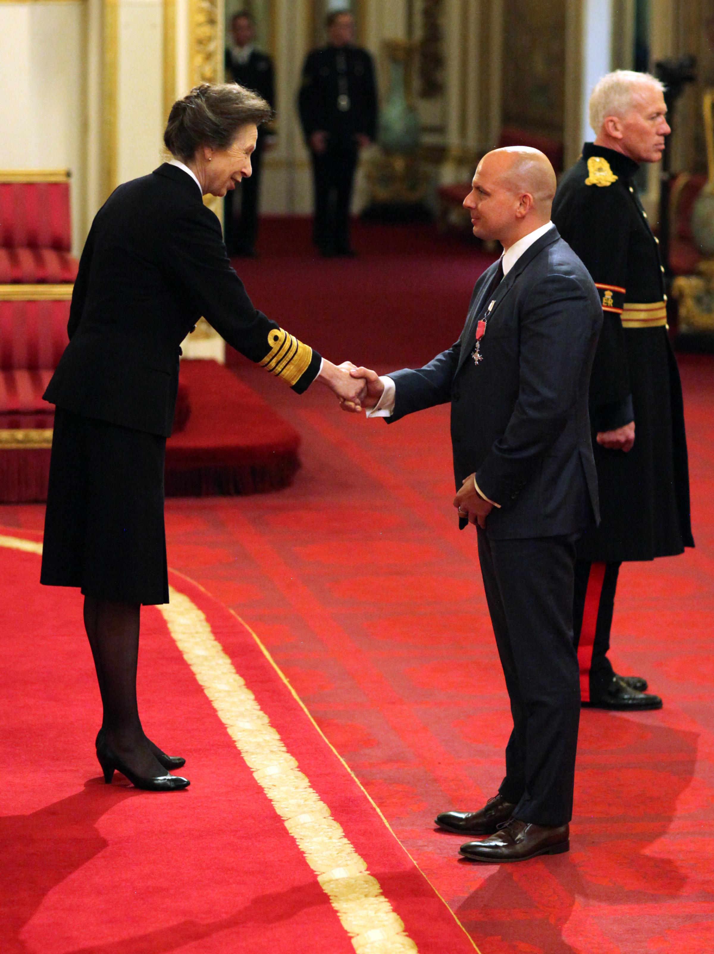 Coming face-to-face with royalty - South Essex Gymnastics Club coach Scott Hann visited Buckingham Palace and was made an MBE by Princess Anne in October 2017