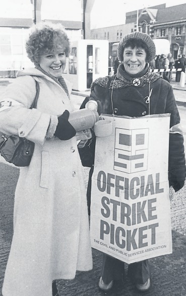 Smiling strikers - civil servants Kim Wallace and Margaret O’Regan on the picketline in Southend in 1979