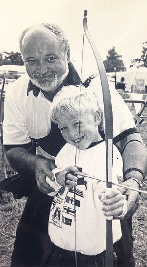 Learning - Bernard Nix from the Willows Park Archery Club in Basildon showed Marc Barnacle, aged five, from Canvey, the basics of archery at the Strawberry Fair in Rochford back in July 1992