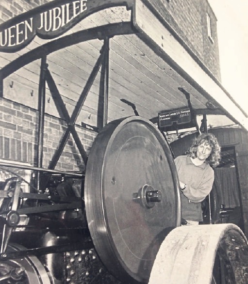 Arriving in style - Ruth Atkinson behind the wheel of a 1924 Aveling and Porter steam roller at the May Fair at Rayleighs Mill Hall in 1992