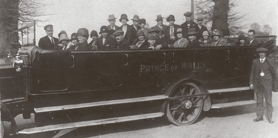 Together - daytrippers to Southend enjoy the view from the comfort of their charabanc in 1926