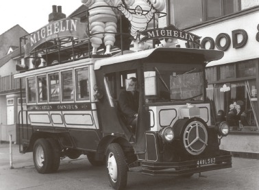 Michelin man in town - a vintage omnibus drives through Westcliff in March 1973