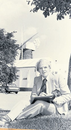 Relaxing - actor Victor Maddern poses in front of the Rayleigh Windmill in 1982
