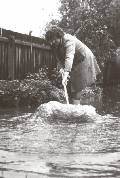 Clean up - Doreen Mann cleaning her home in Park Avenue, Eastwood, in 1978