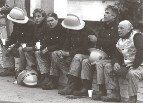 Enjoying a well-deserved breather - firefighters take a break after a fraught night