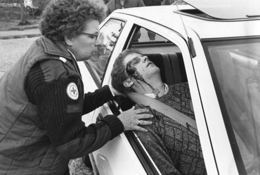 Bloody scene - Betty Korten tends to Trevor Deacons fake head wound during a Castle Point Red Cross exercise in 1985